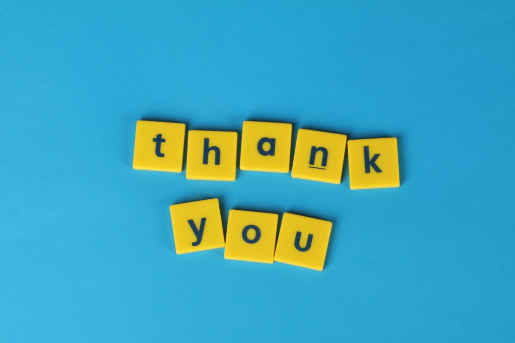 thank you letters on blue background